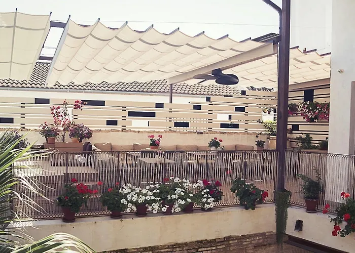 מלון Boutique Patio Del Posadero